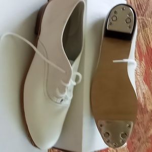 Size91/2 B never worn clogging shoes